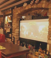 An 84" video screen provides the entertainment for your night in during your stay in Cricklade, Wiltshire